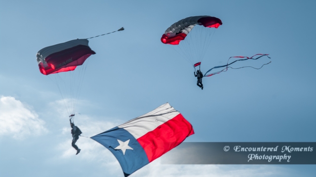 Skydivers with Texas Flag